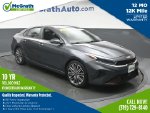 2022 Kia Forte GT — Gray primary exterior view, for sale at McGrath Ford in Hiawatha, IA
