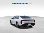 2026 Kia K4 LXS — Snow White Pearl exterior view 6, for sale at McGrath Ford in Hiawatha, IA