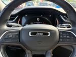 2021 Jeep GRAND CHEROKEE L Limited — Velvet Red Pearlcoat interior and detail view 14, for sale at Autostar CDJR of Hendersonville in Hendersonville, NC