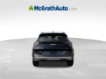 2027 Kia Sportage Hybrid SX-Prestige — Fusion Black exterior view 7, for sale at McGrath Ford in Hiawatha, IA