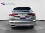 2023 Mitsubishi Outlander PHEV SE — Silver exterior view 4, for sale at Koppy motors in forest lake, MN