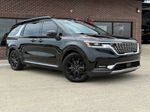 2024 Kia Carnival SX — Aurora Black exterior view 7, for sale at Velocity Auto Source in RICHMOND, KY