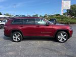 2021 Jeep GRAND CHEROKEE L Limited — Velvet Red Pearlcoat exterior view 2, for sale at Autostar CDJR of Hendersonville in Hendersonville, NC