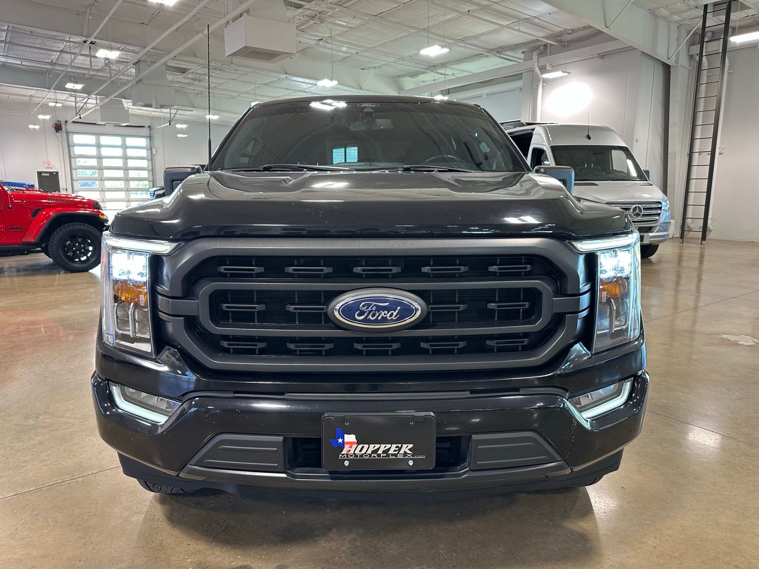 View vehicle photo 2