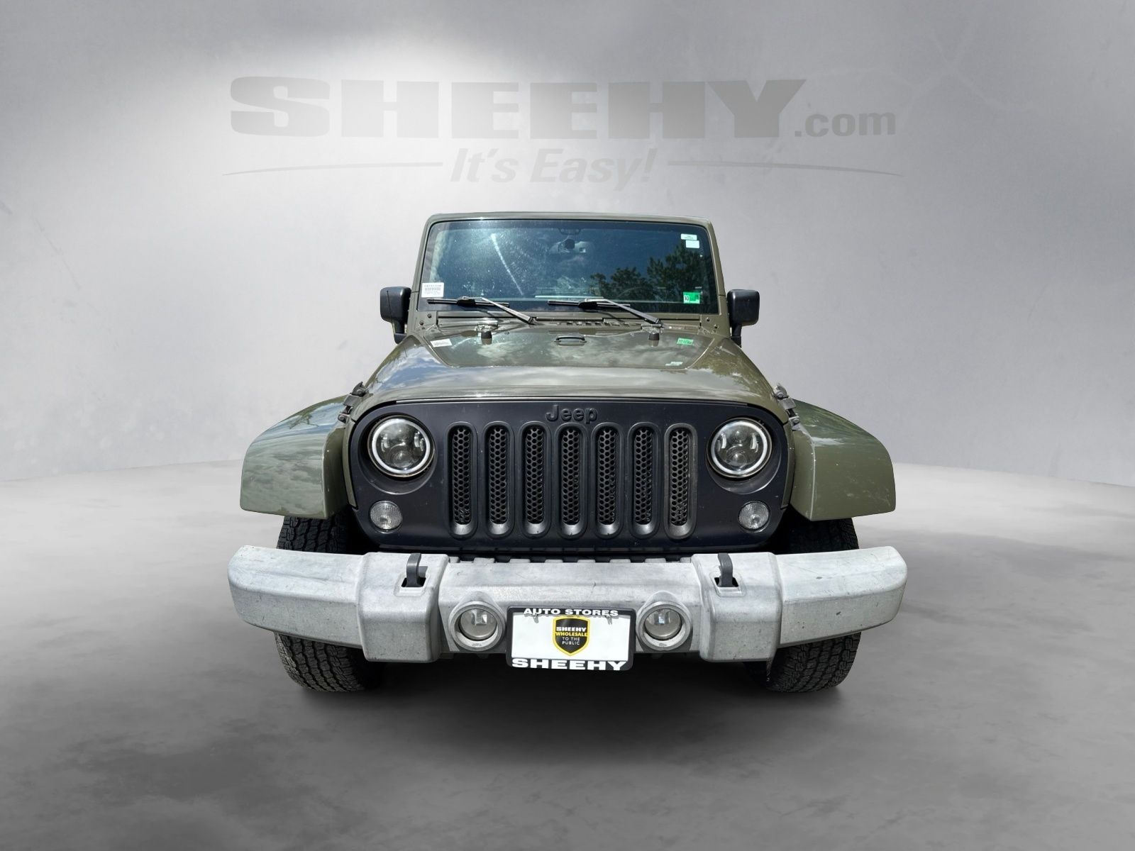 Used 2015 Tank Clearcoat Jeep Unlimited Sahara image 16