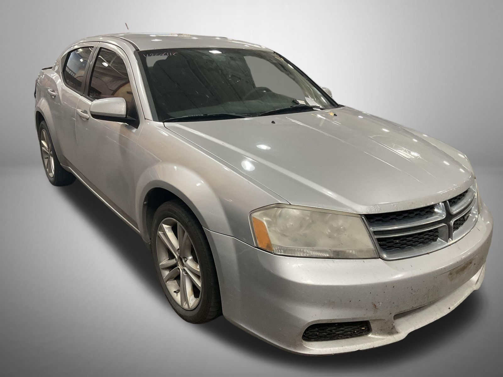 Bright Silver Metallic Clearcoat 2012 Dodge Avenger Sedan Front-Wheel Drive 6-Speed Automatic