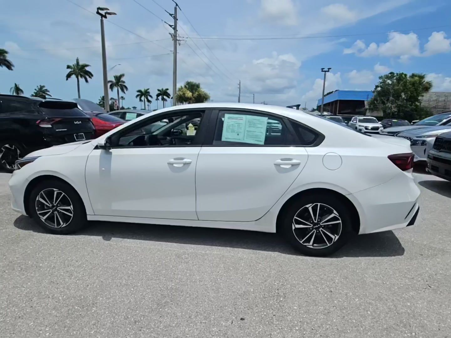 Snow White Pearl 2023 Kia Forte Sedan Front-Wheel Drive Continuously Variable Transmission