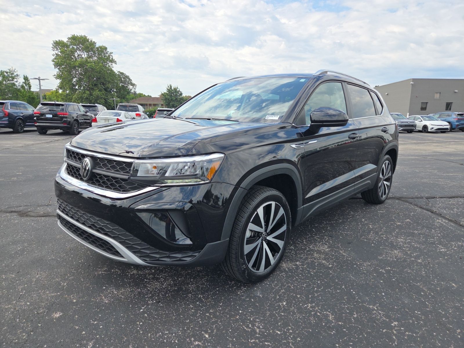 used 2023 Volkswagen Taos car, priced at $24,150