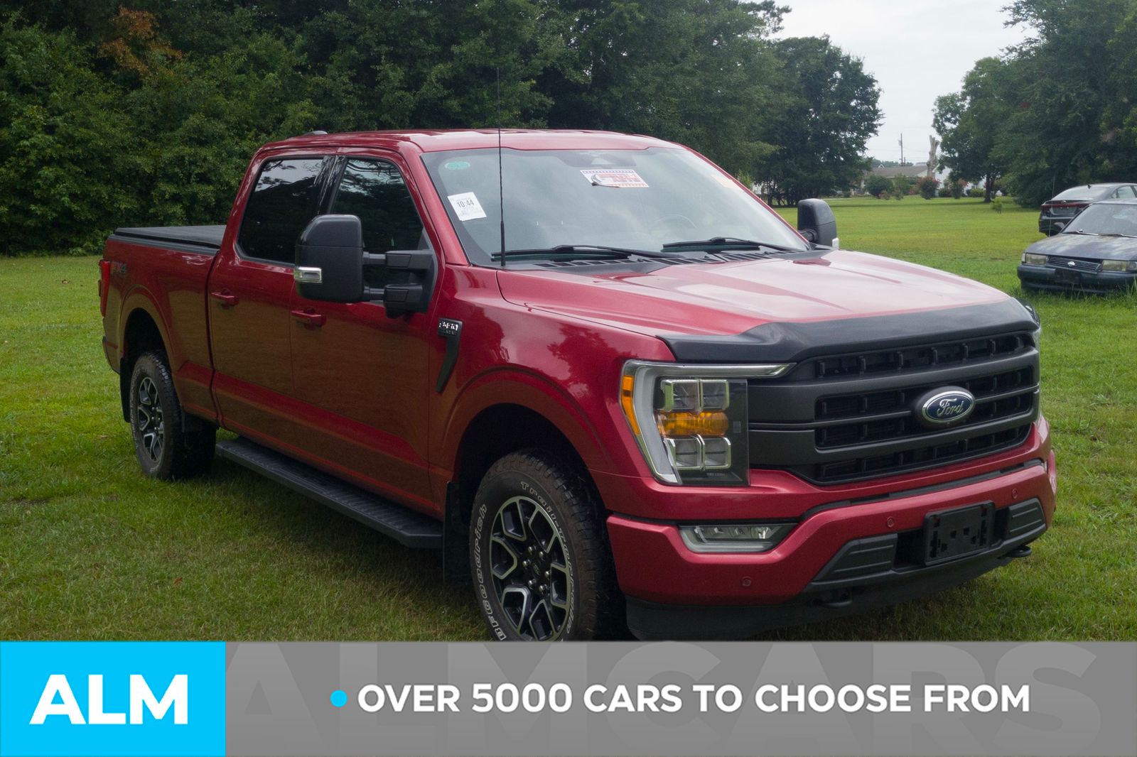 Used 2023 Rapid Red Metallic Tinted Clearcoat Ford Lariat image 3