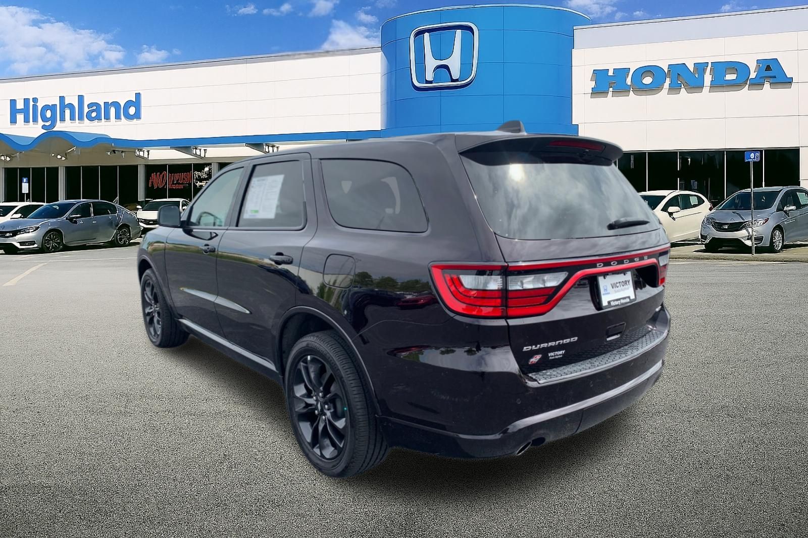 View vehicle photo 3