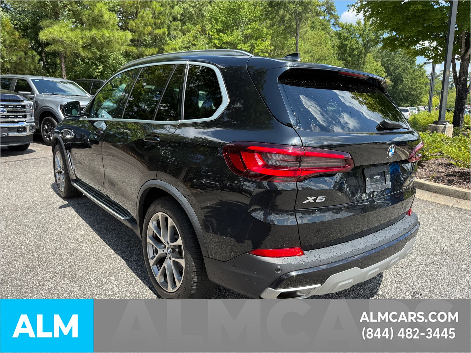 Used 2023 Black Sapphire Metallic BMW sDrive40i image 11