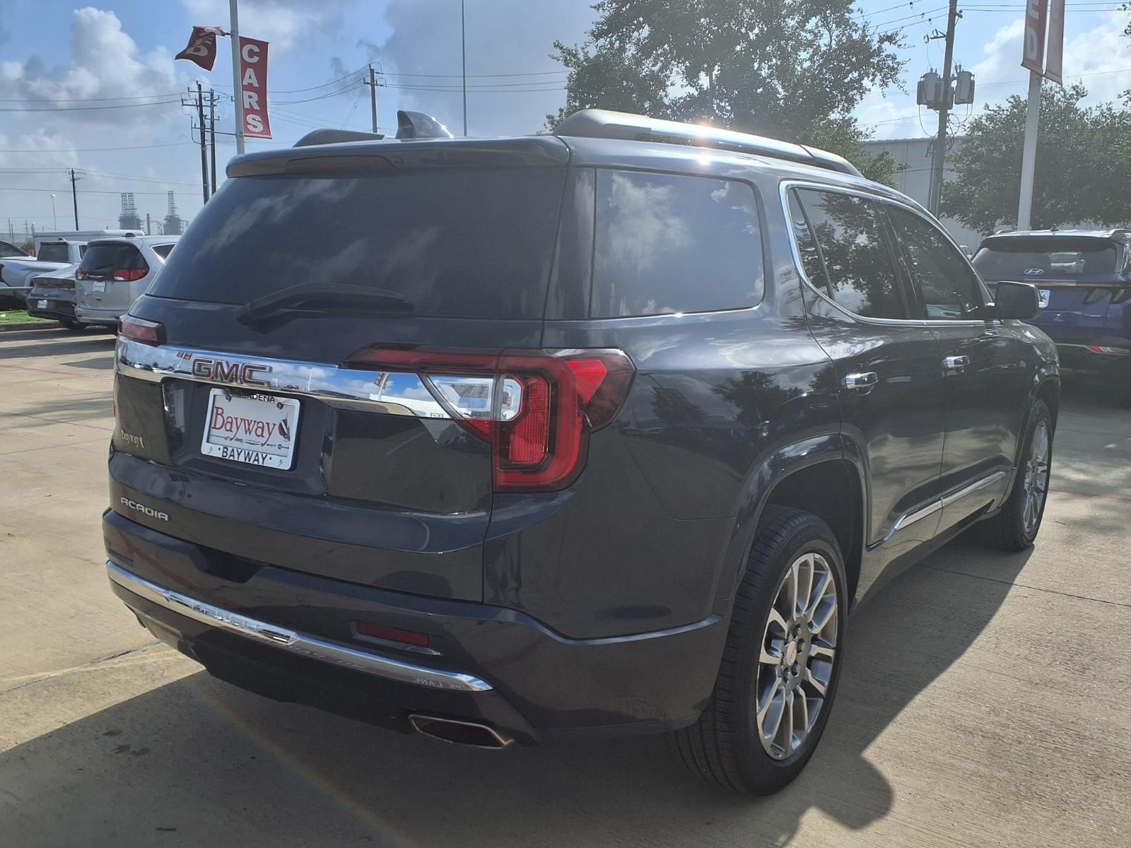 2022 GMC Acadia Denali Green at AutoSavvy Houston Southwest