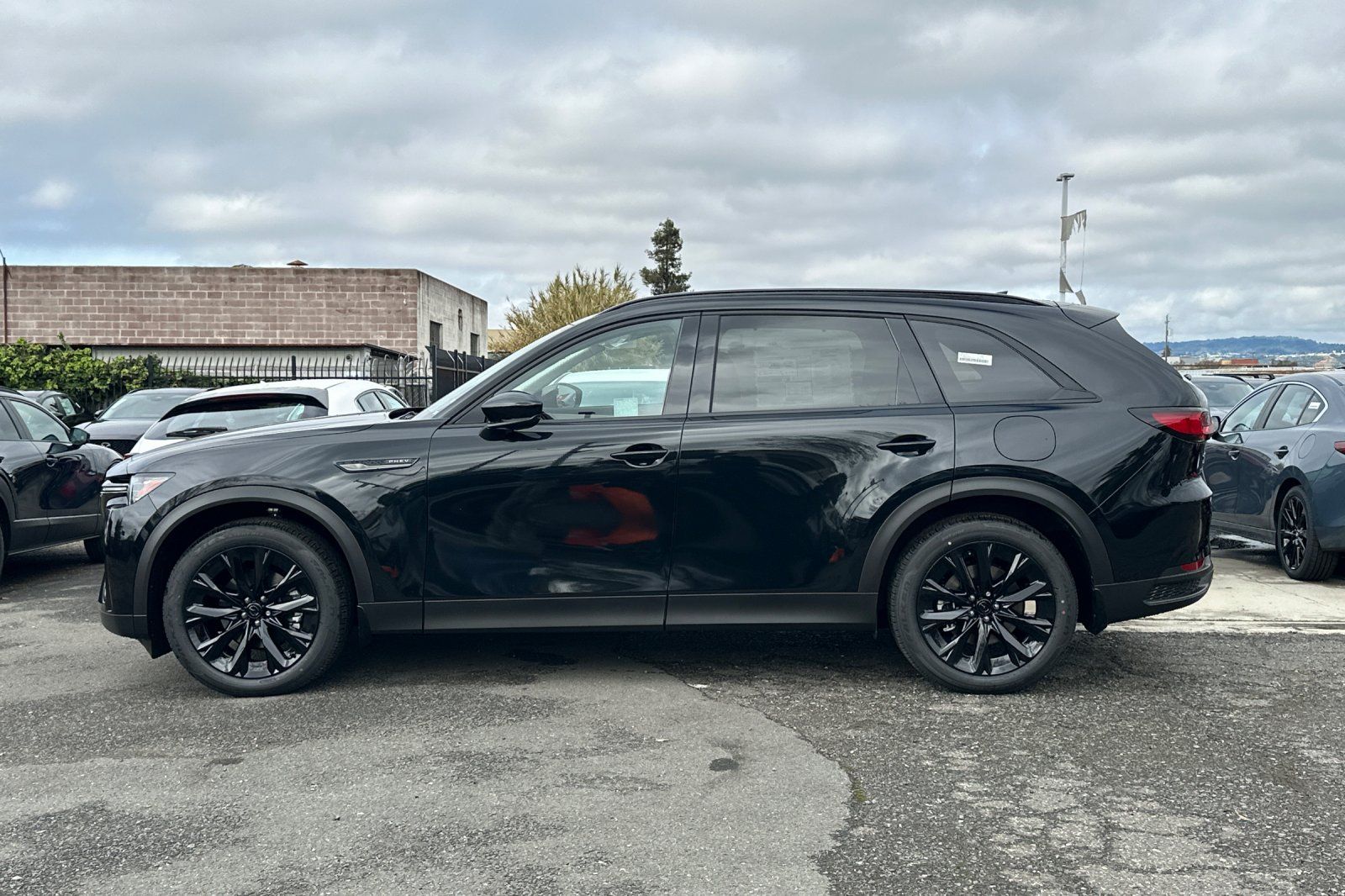 New 2026 Black Mazda Premium image 6