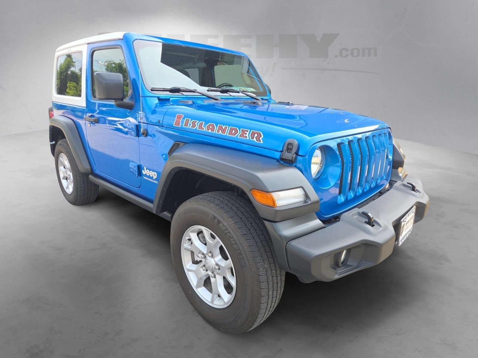 Used 2021 Blue Jeep Sport image 2