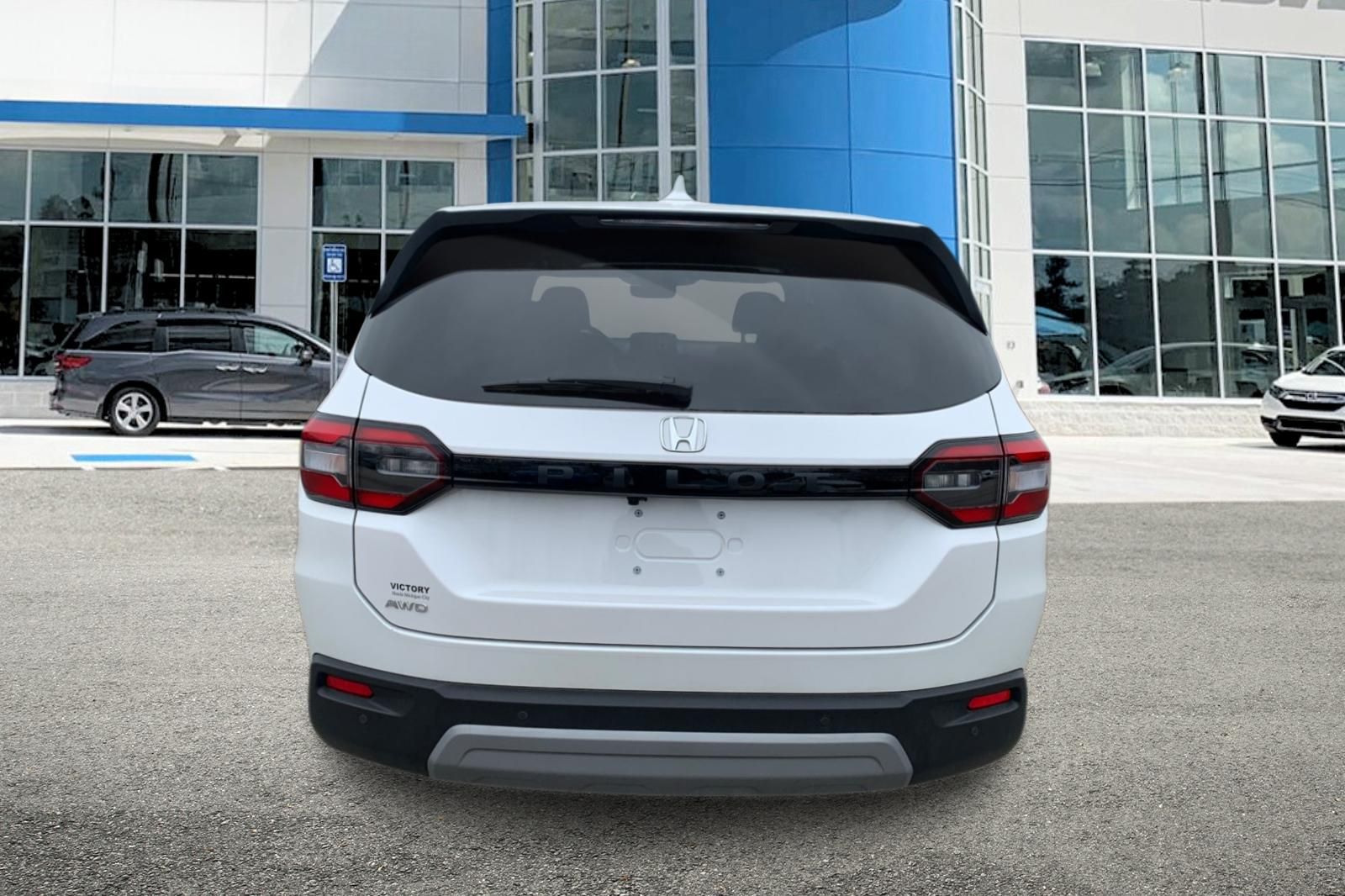 View vehicle photo 4