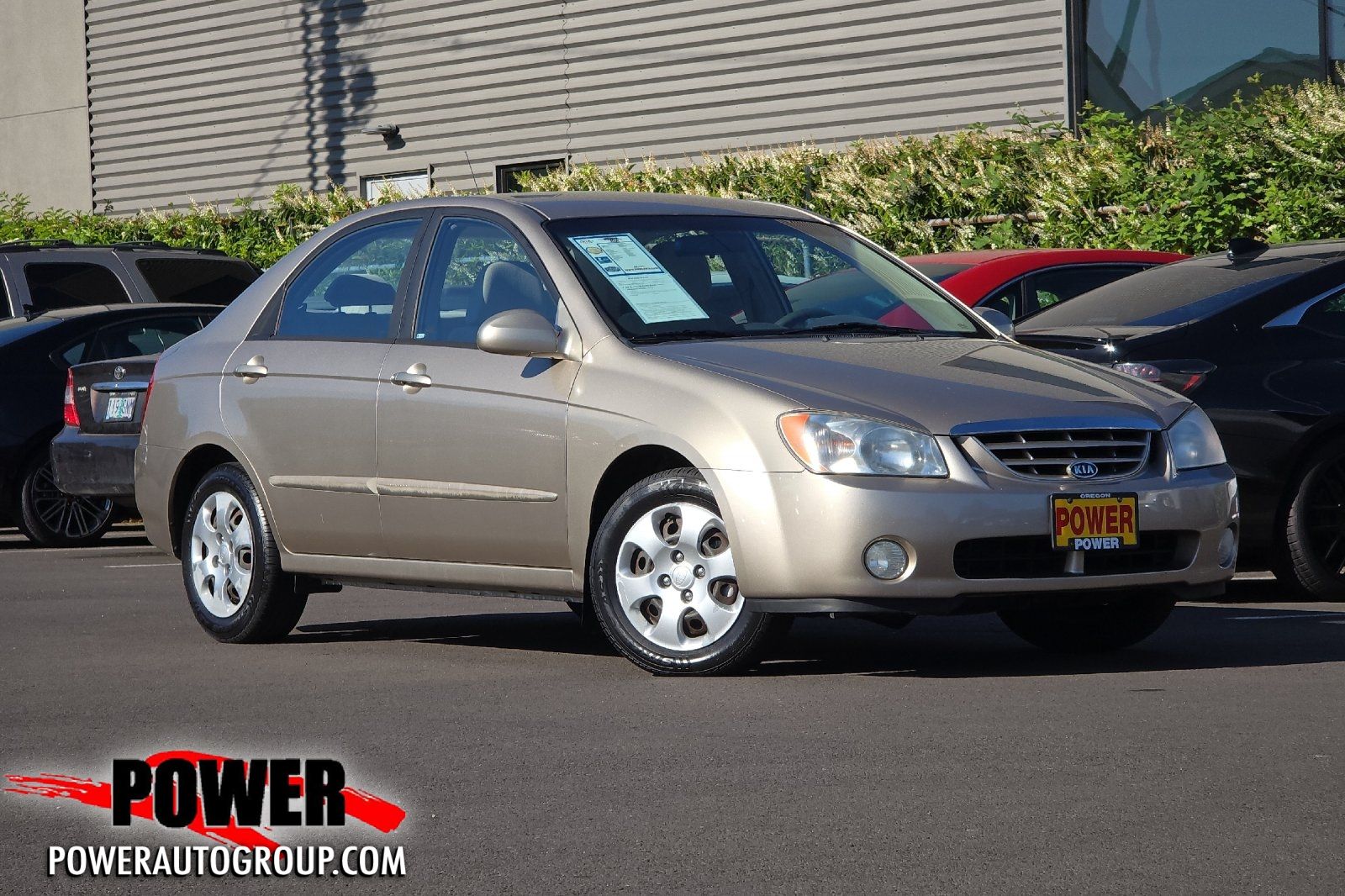 White 2005 Kia Spectra EX Sedan Front-Wheel Drive 4-Speed Automatic Overdrive