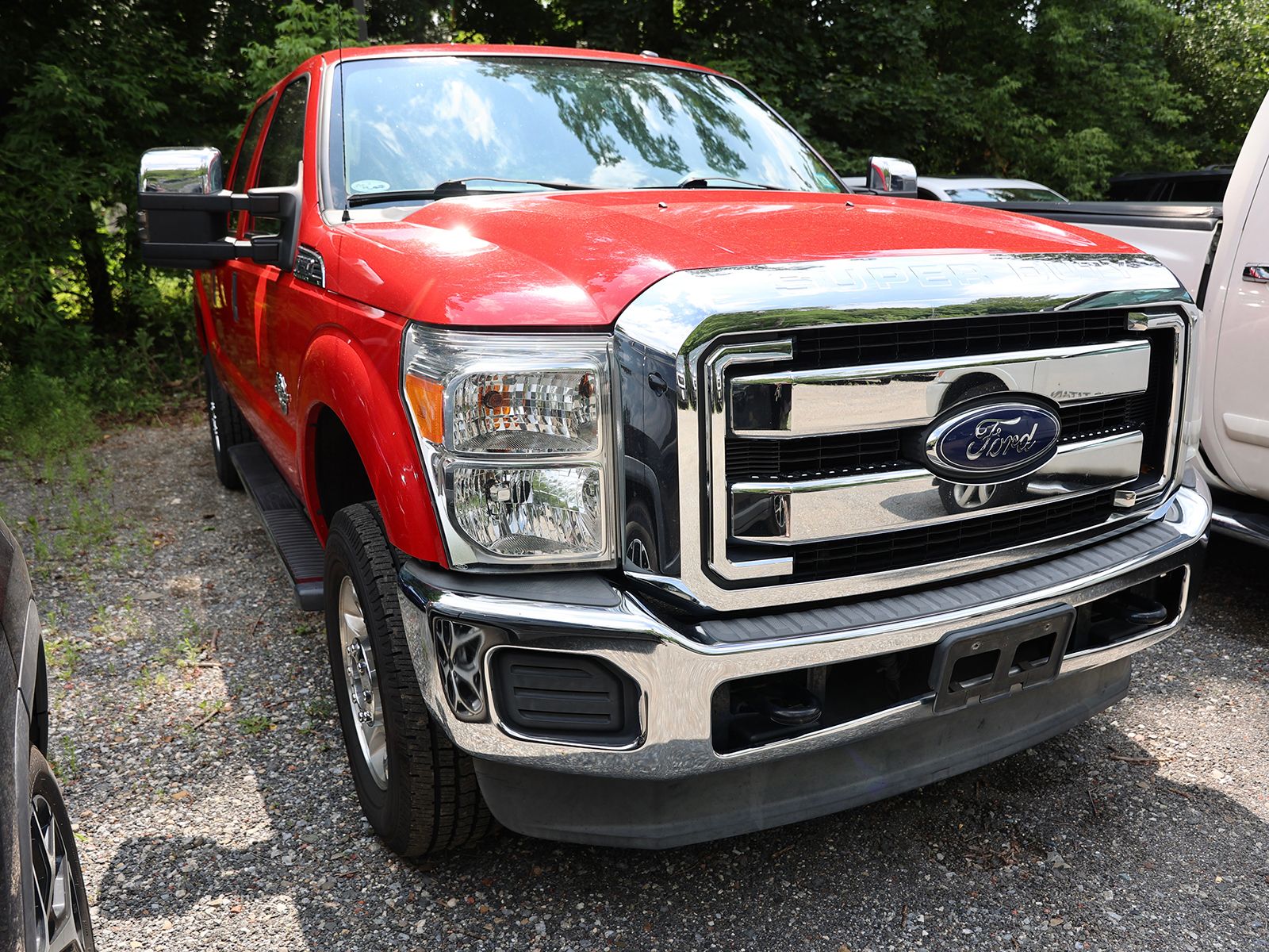 Vermillion Red 2015 Ford F-250 Super Duty Pickup Truck Four-Wheel Drive 6-Speed Automatic Overdrive