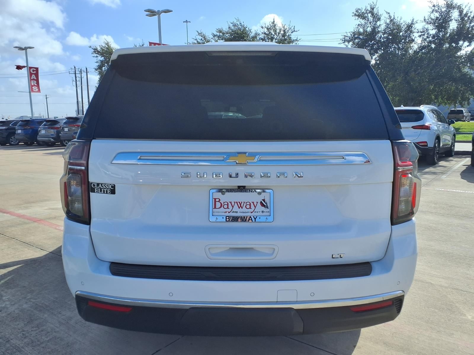 2024 Chevrolet Suburban LT White at Victoria Chrysler Dodge Jeep Ram