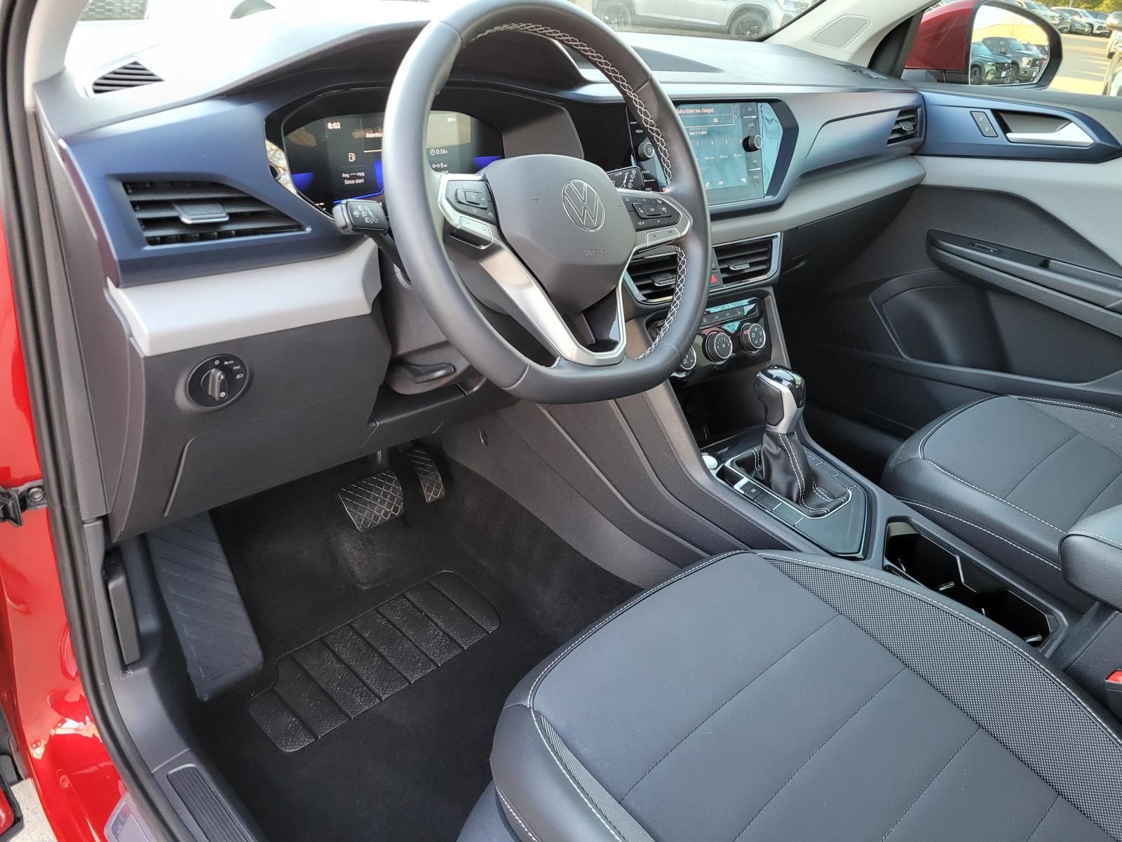 used 2023 Volkswagen Taos car, priced at $21,900