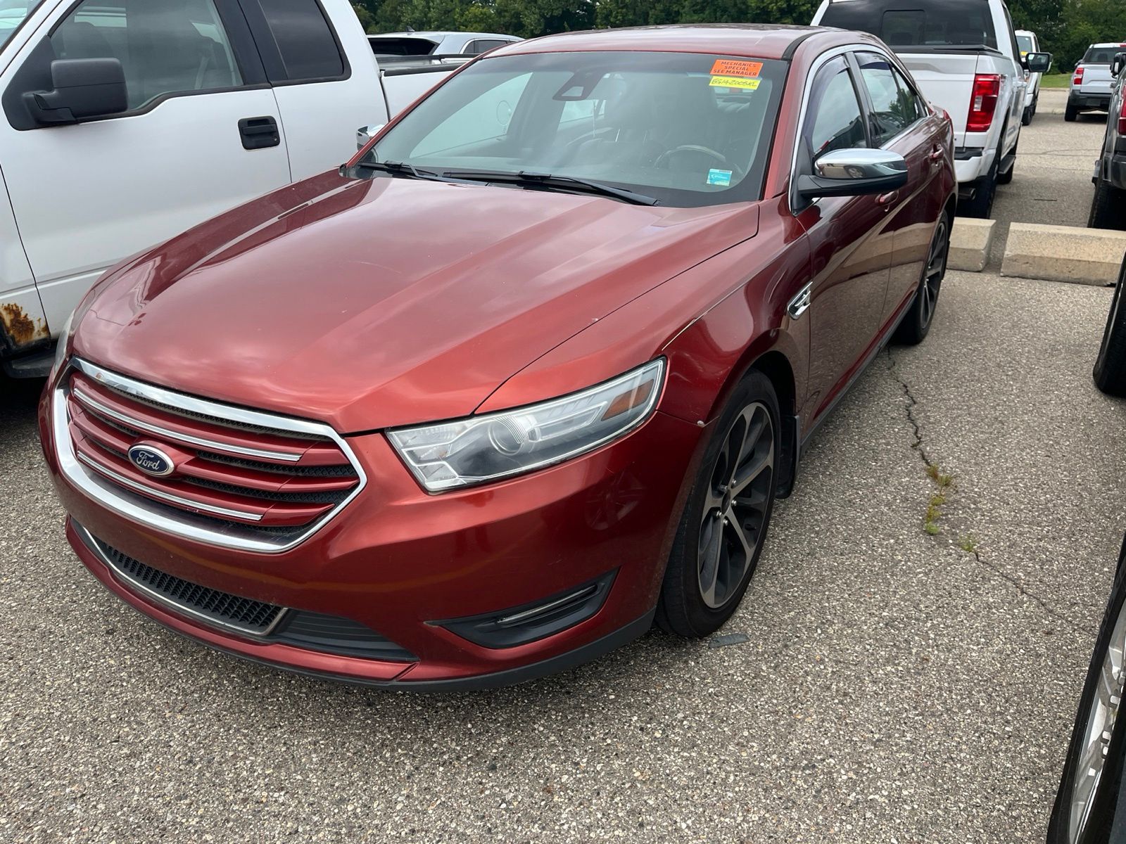 Red (Sunset Metallic) 2014 Ford Taurus Sedan Front-Wheel Drive 6-Speed Automatic