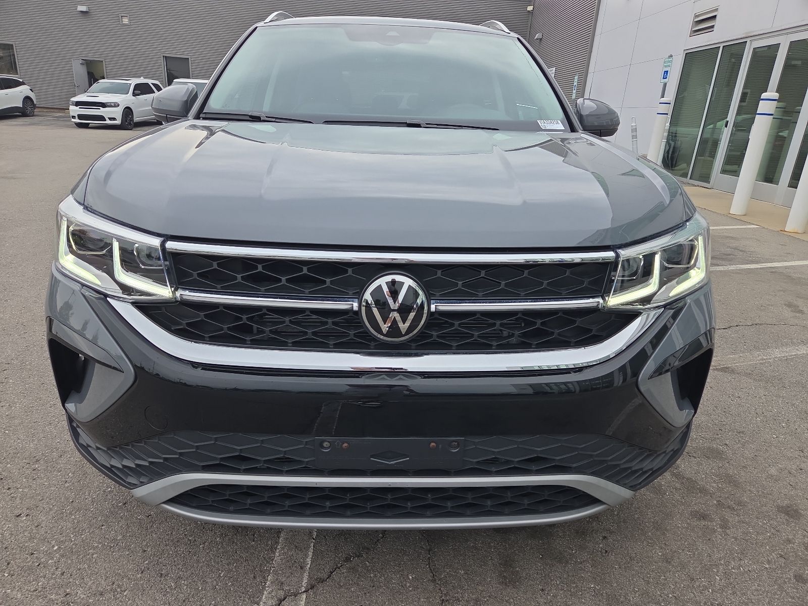 used 2023 Volkswagen Taos car, priced at $23,547