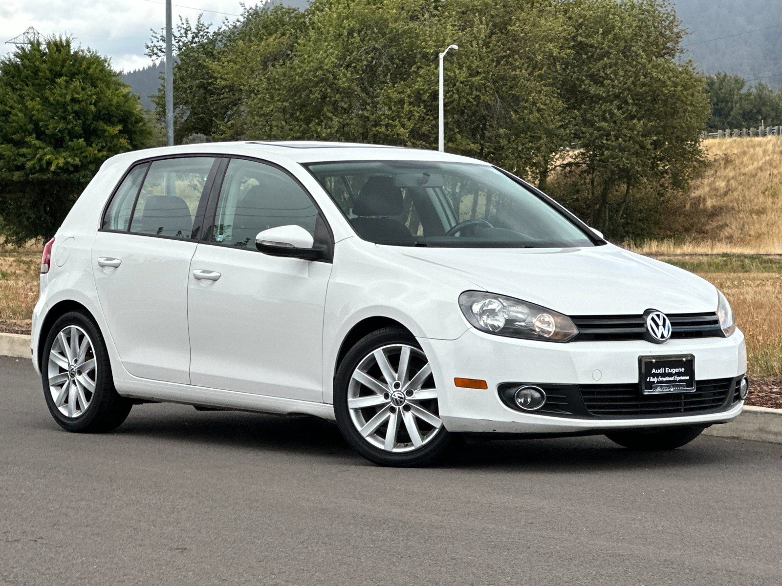 Candy White 2011 Volkswagen Golf Hatchback Front-Wheel Drive 6-Speed Dual Clutch
