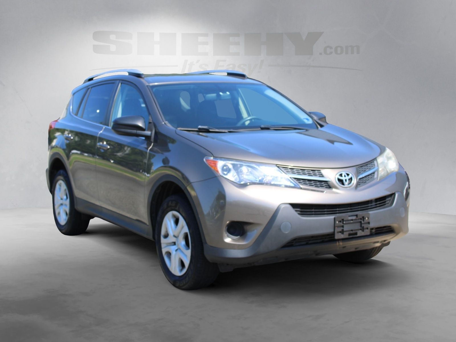 Used 2015 Brown Toyota LE image 2