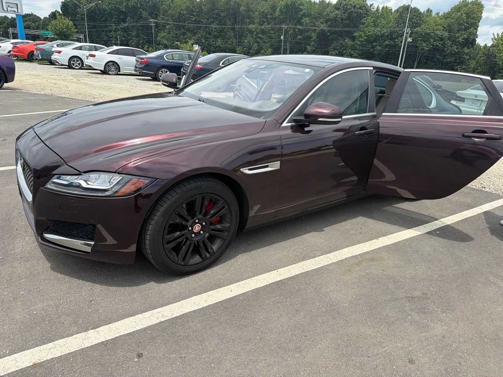 Aurora Red Metallic 2016 Jaguar XF Sedan Rear-Wheel Drive 8-Speed Automatic