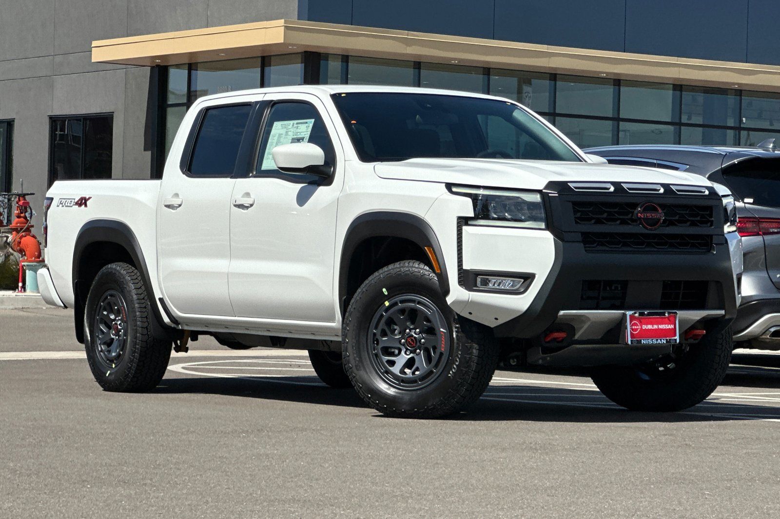 Glacier White 2026 Nissan Frontier Pickup Truck Four-Wheel Drive 9-Speed Automatic Overdrive