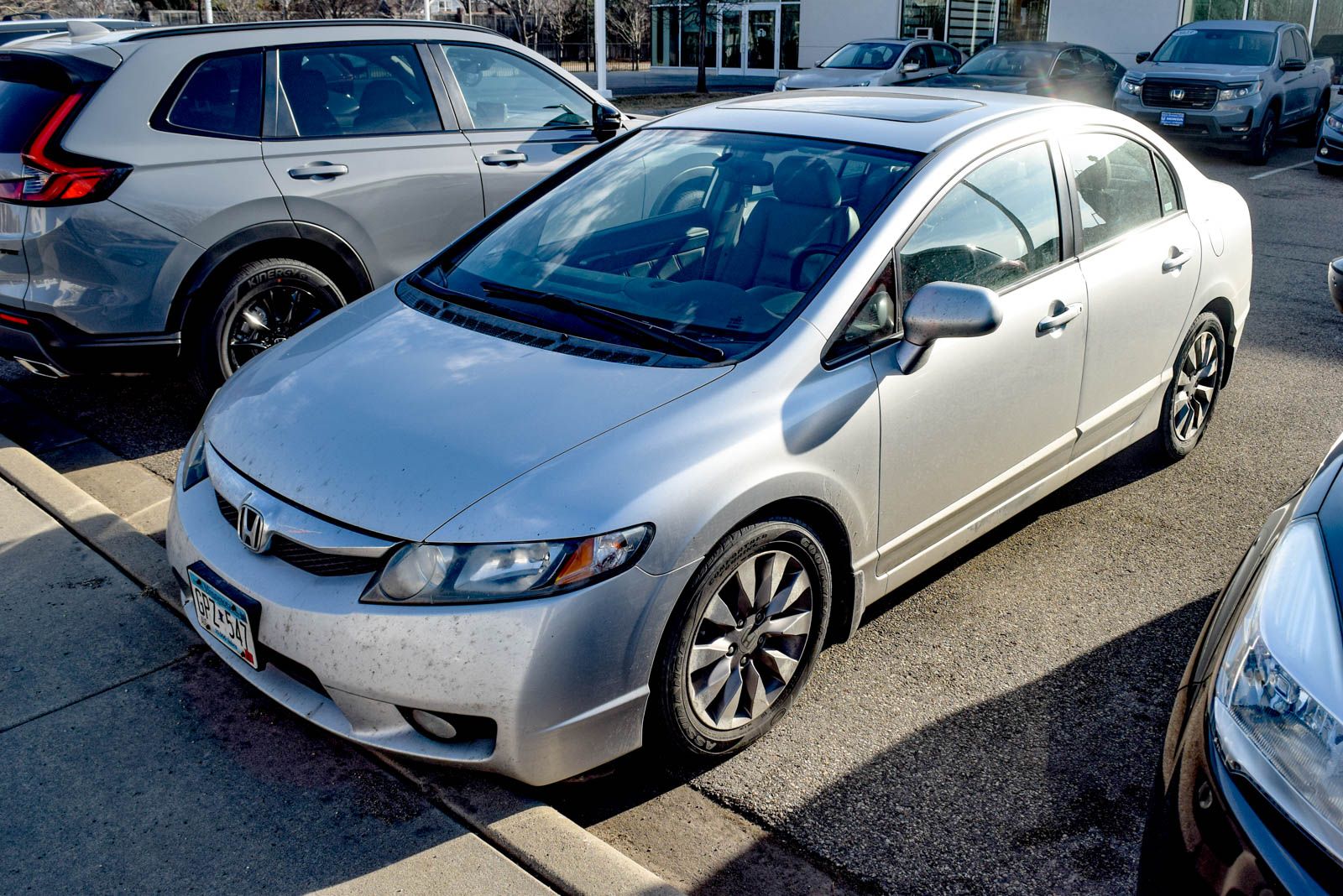 Alabaster Silver Metallic 2009 Honda Civic EX-L Sedan Front-Wheel Drive 5-Speed Automatic
