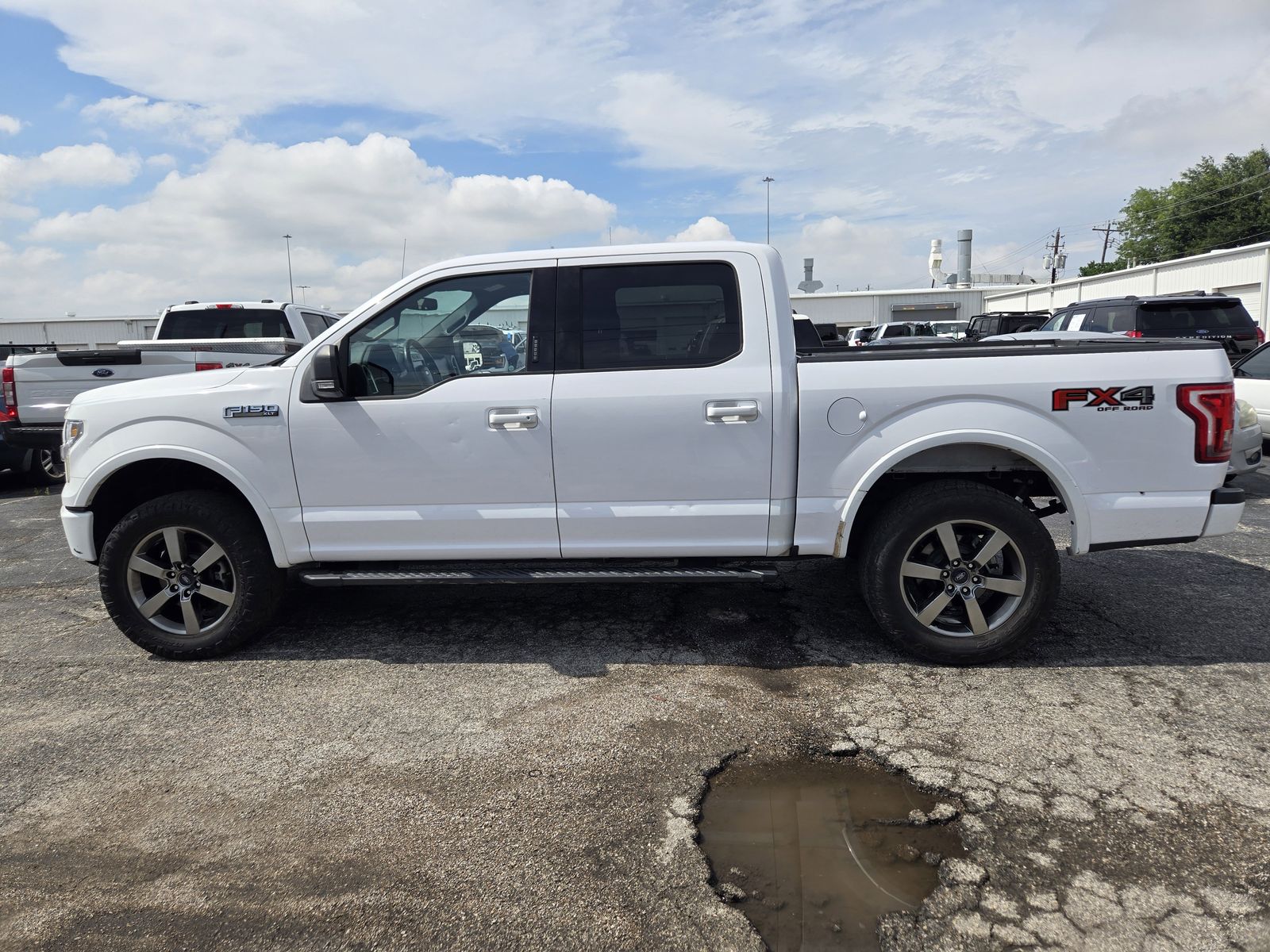 View vehicle photo 4