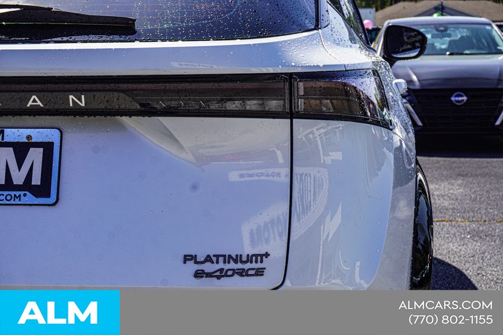 Used 2023 White Nissan PLATINUM+ e-4ORCE image 14