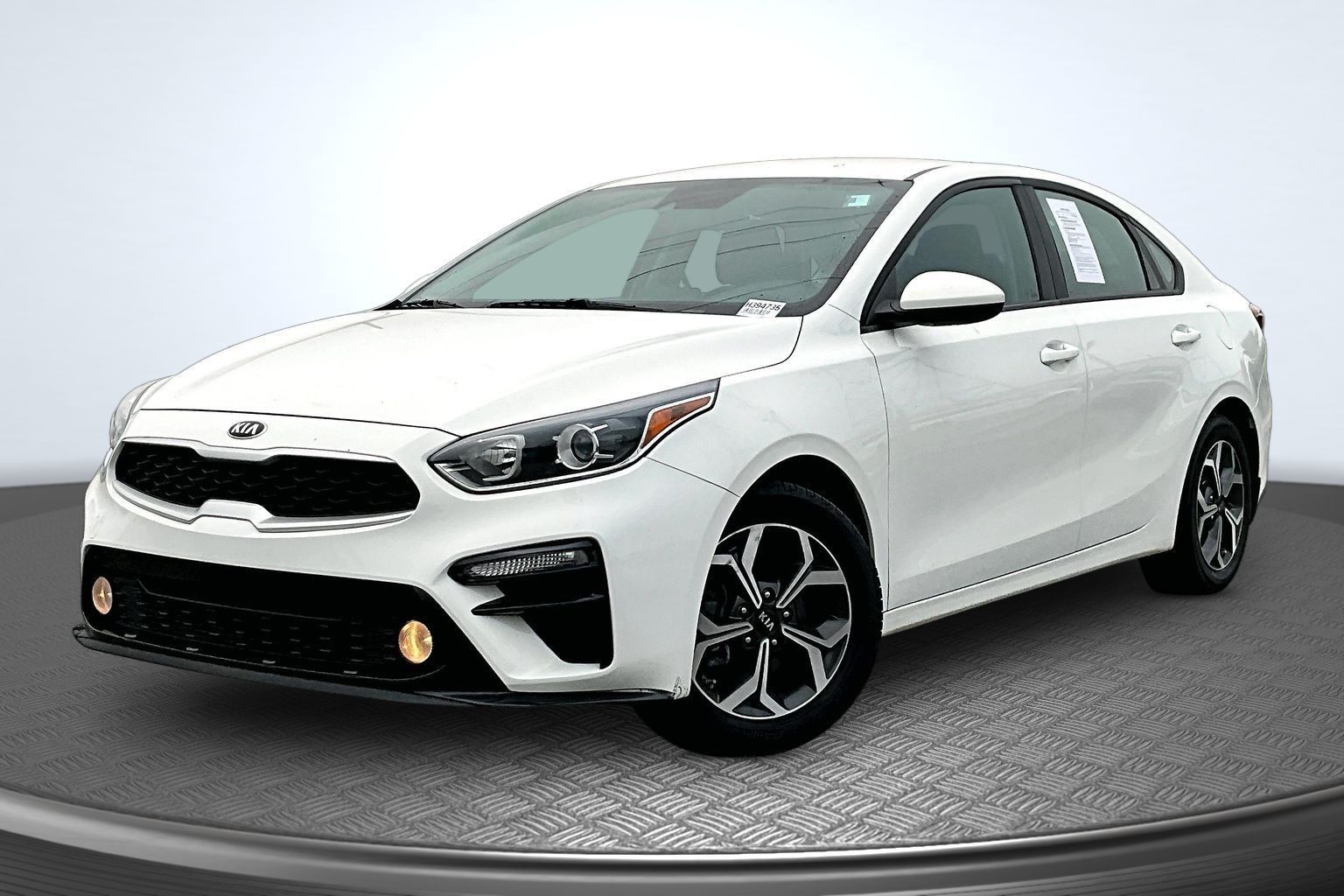 Clear White 2021 Kia Forte Sedan Front-Wheel Drive Continuously Variable Transmission