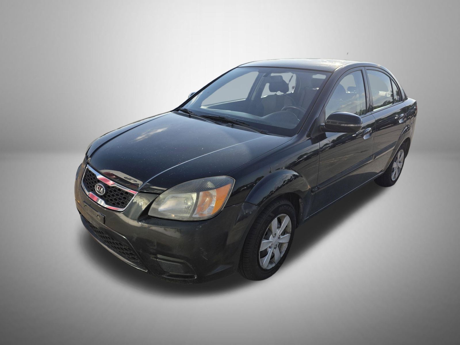 Midnight Black 2011 Kia Rio LX Sedan Front-Wheel Drive 4-Speed Automatic Overdrive
