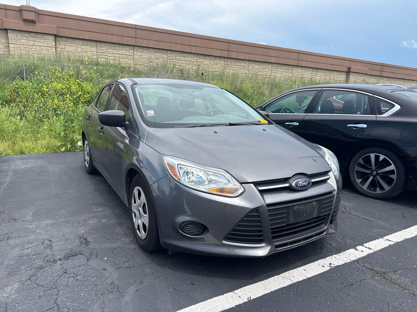 Sterling Gray Metallic 2013 Ford Focus Sedan Front-Wheel Drive 6-Speed Automatic