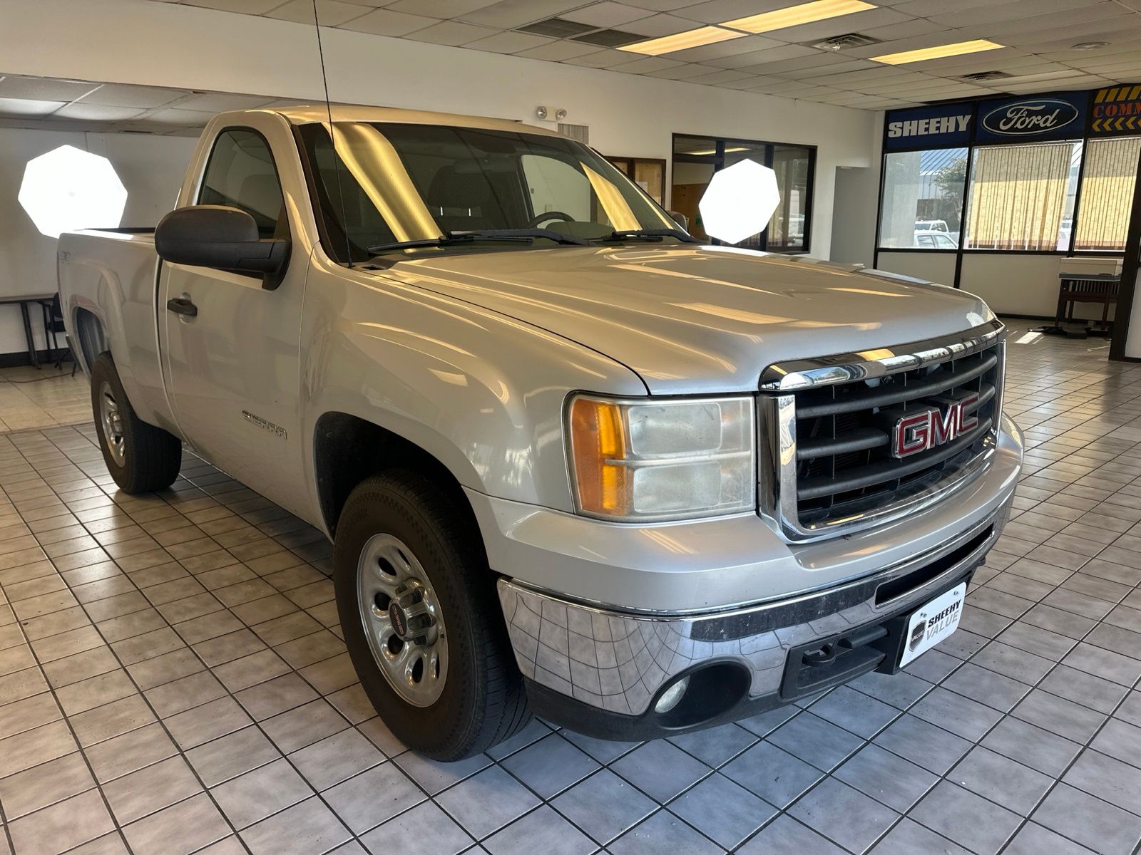 Pure Silver Metallic 2011 GMC Sierra 1500 Pickup Truck Four-Wheel Drive 4-Speed Automatic Overdrive
