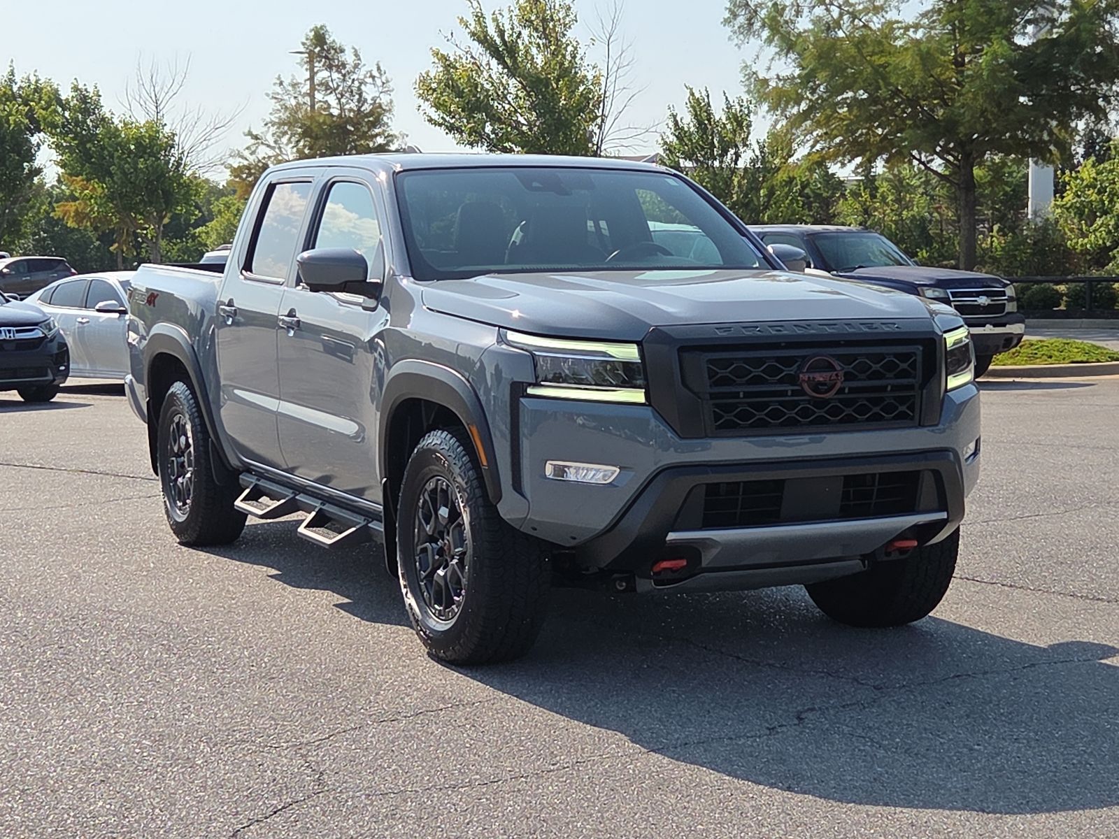 Boulder Gray Pearl 2023 Nissan Frontier Pickup Truck Four-Wheel Drive 9-Speed Automatic