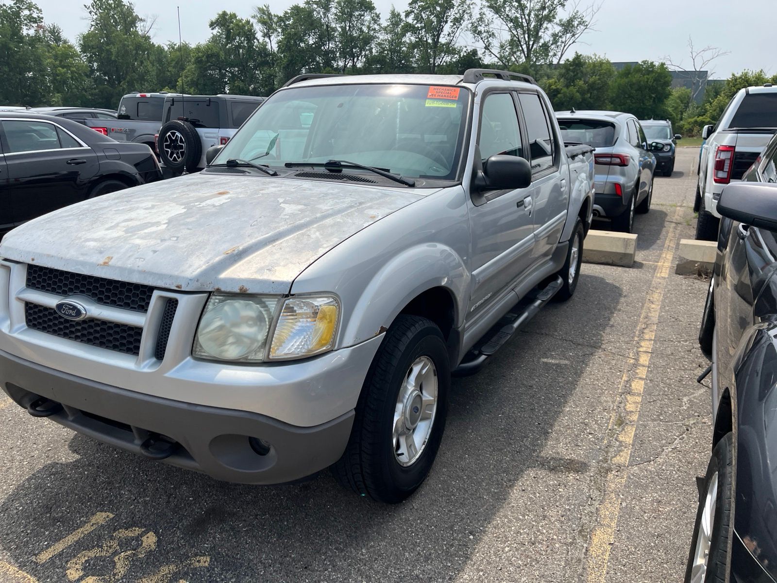 Silver 2001 Ford Explorer Sport Trac Pickup Truck Four-Wheel Drive 5-Speed Automatic Overdrive