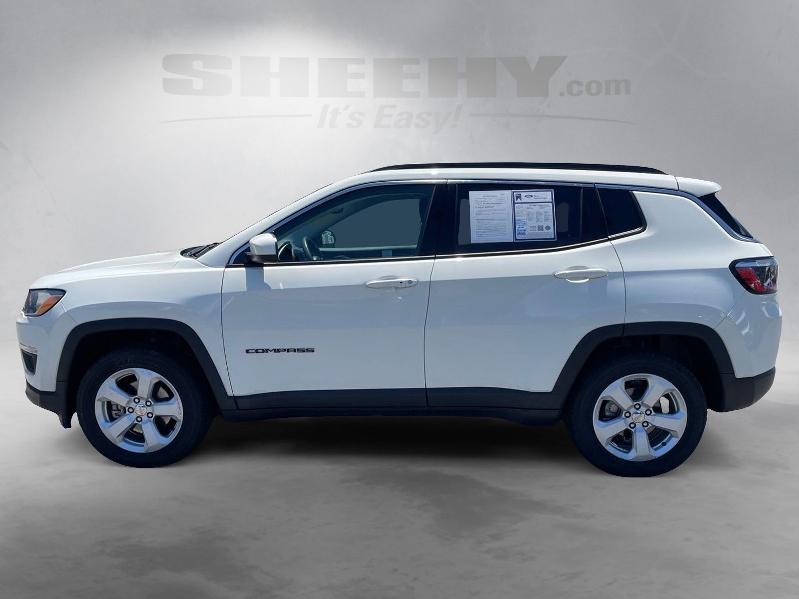 Used 2021 White Clearcoat Jeep Latitude image 7