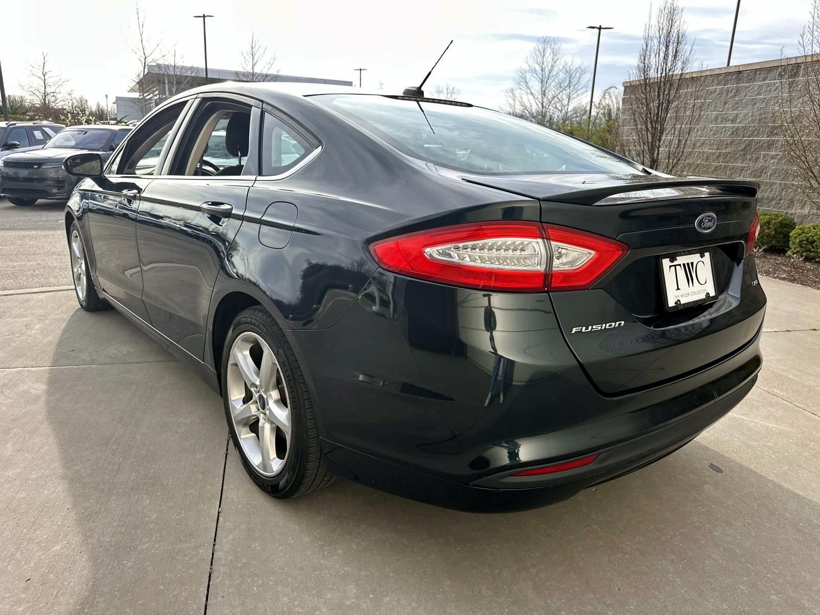 View vehicle photo 7