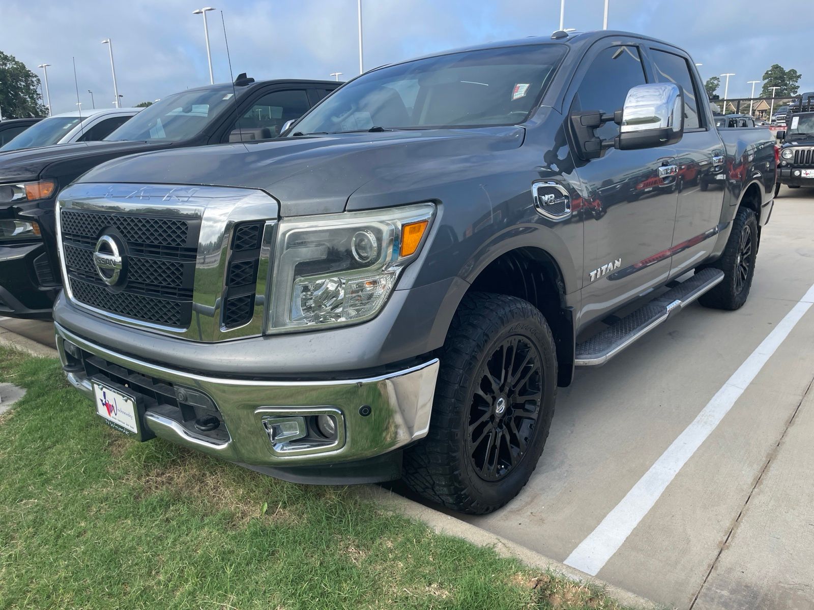 Gray (Gun Metallic) 2017 Nissan Titan Pickup Truck Four-Wheel Drive 7-Speed Automatic
