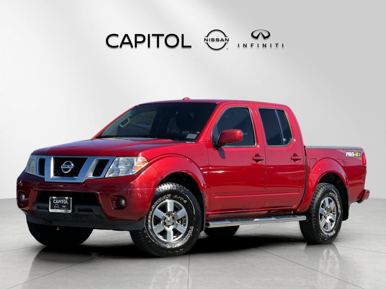 Lava Red 2013 Nissan Frontier Pickup Truck Four-Wheel Drive 5-Speed Automatic Overdrive