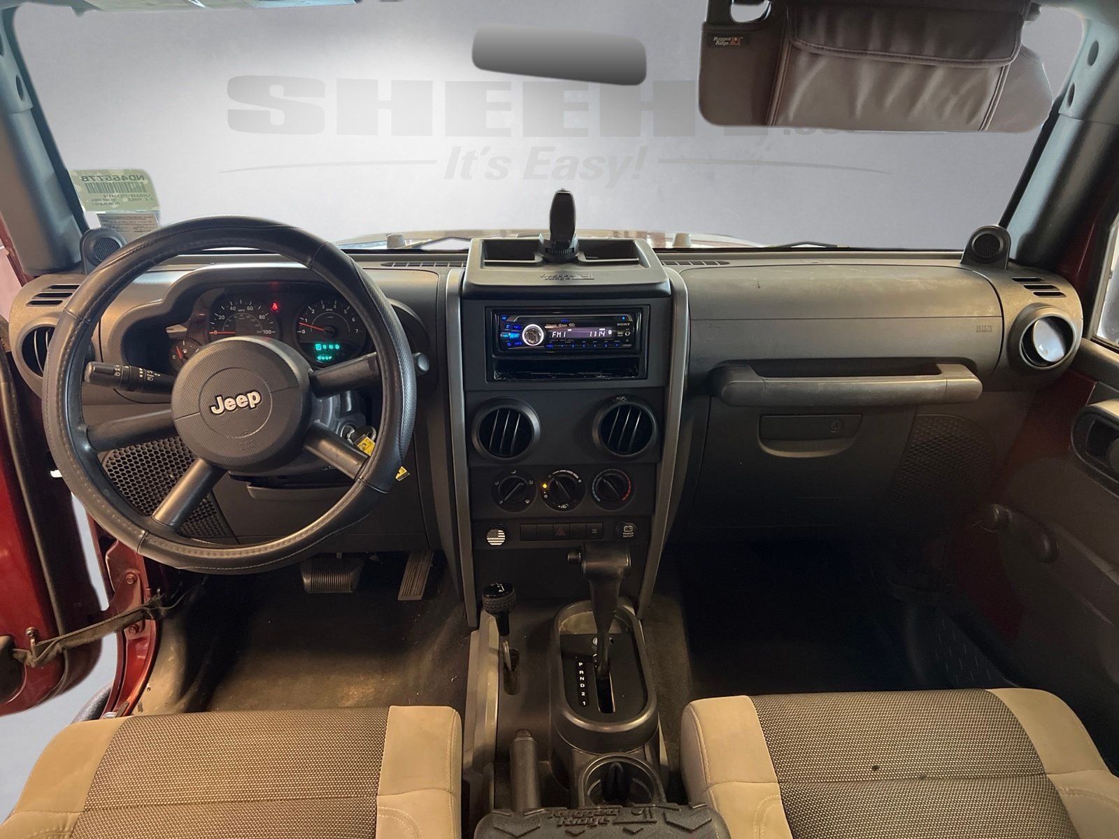 Used 2007 Red Rock Crystal Pearlcoat Jeep Unlimited X image 3