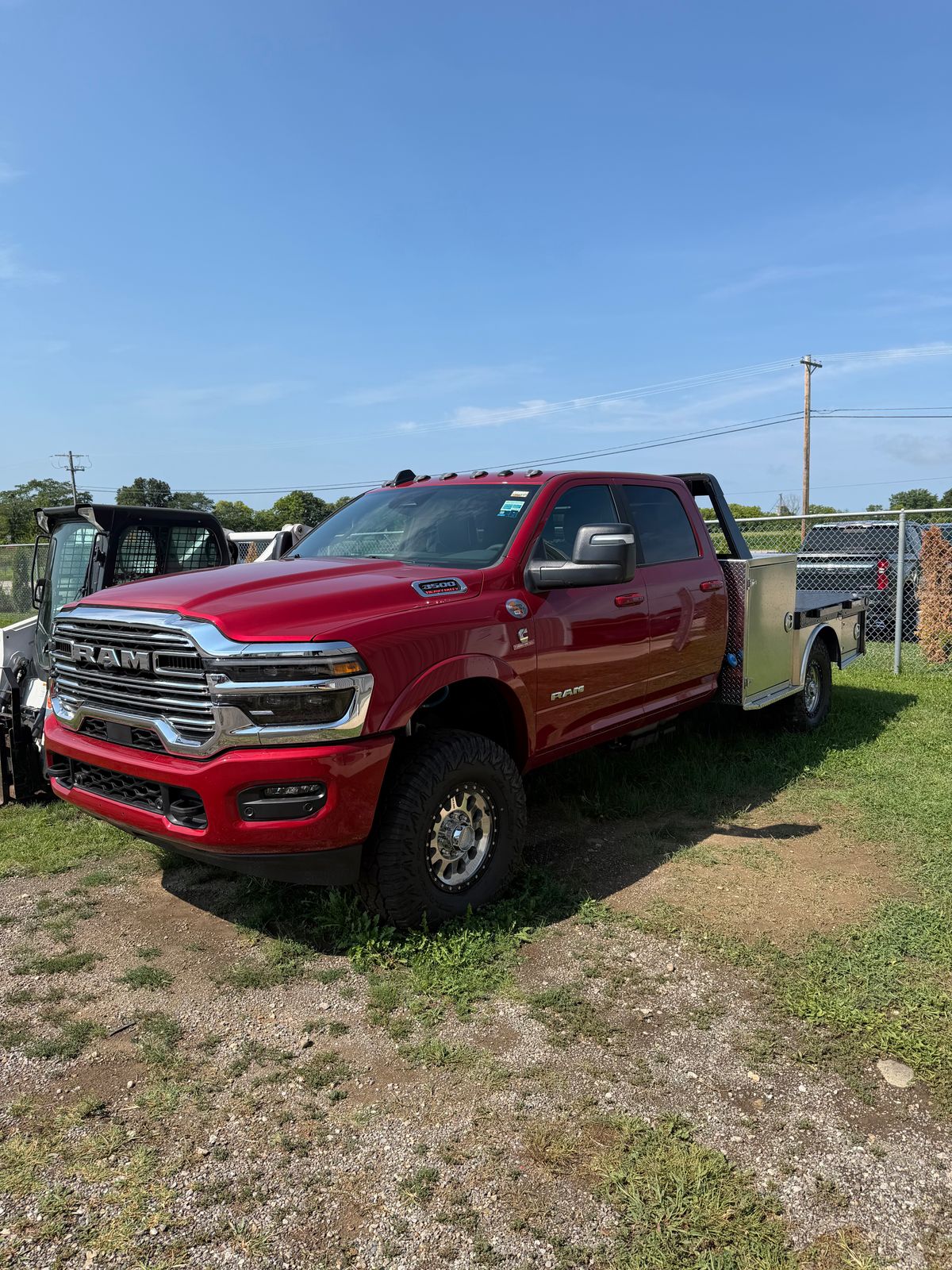 Molten Red Pearlcoat 2026 RAM 3500 Chassis Pickup Truck Four-Wheel Drive 8-Speed Automatic