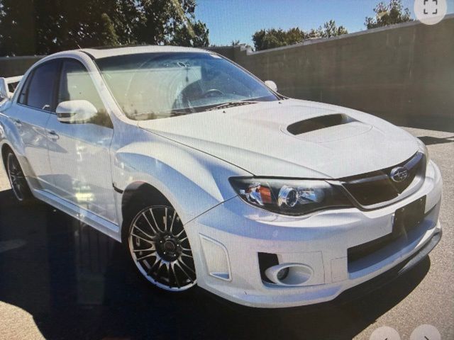 Satin White Pearl 2011 Subaru Impreza WRX STI Sedan All-Wheel Drive 6-Speed Manual