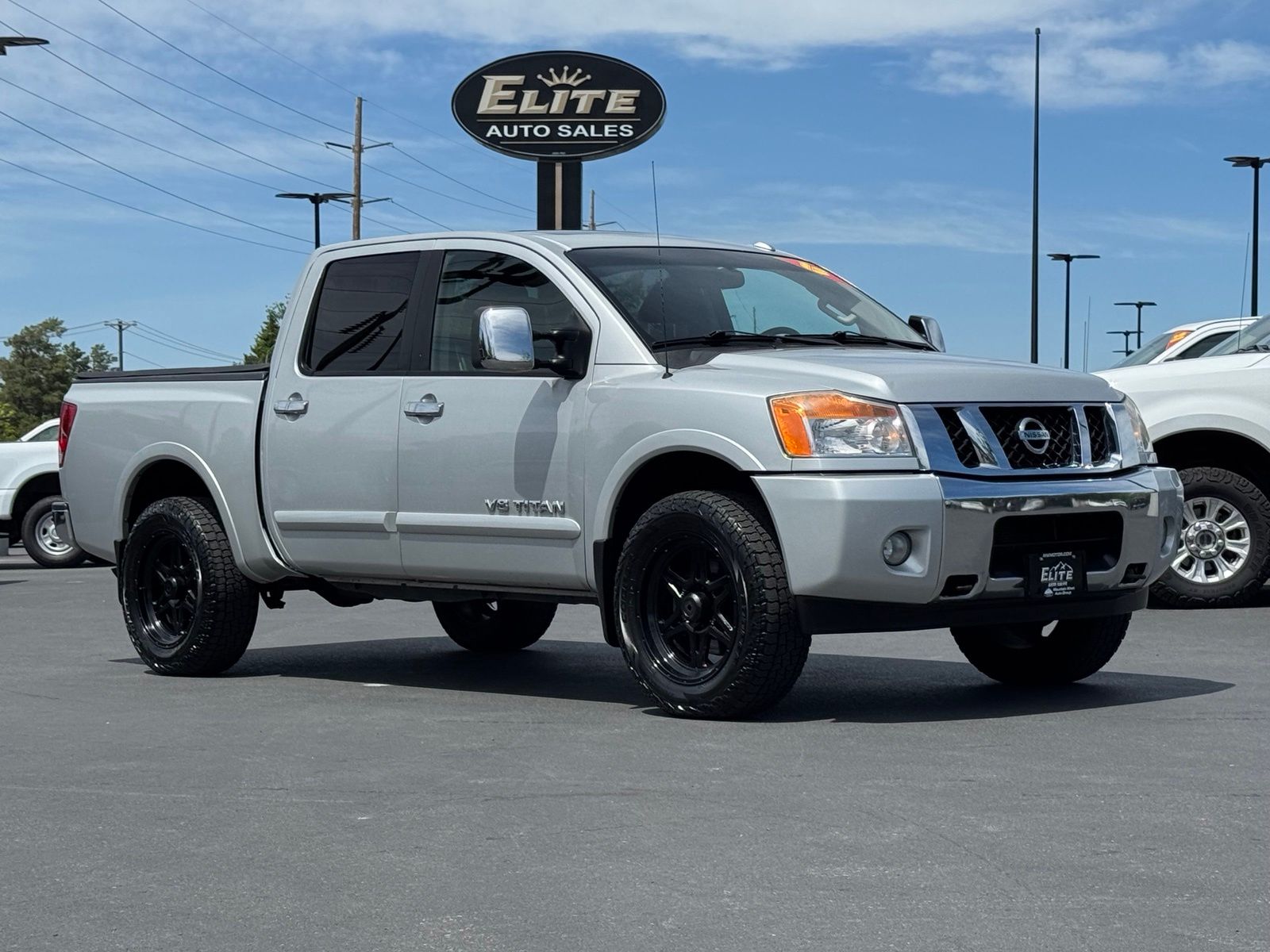 Silver 2013 Nissan Titan SL Crew Cab 4WD Pickup Truck Four-Wheel Drive 5-Speed Automatic
