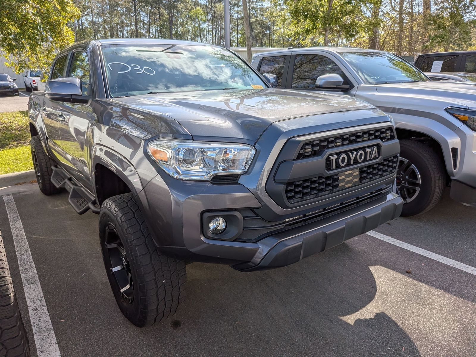 Magnetic Gray Metallic 2021 Toyota Tacoma SR I4 Double Cab RWD Pickup Truck 4X2 6-Speed Automatic