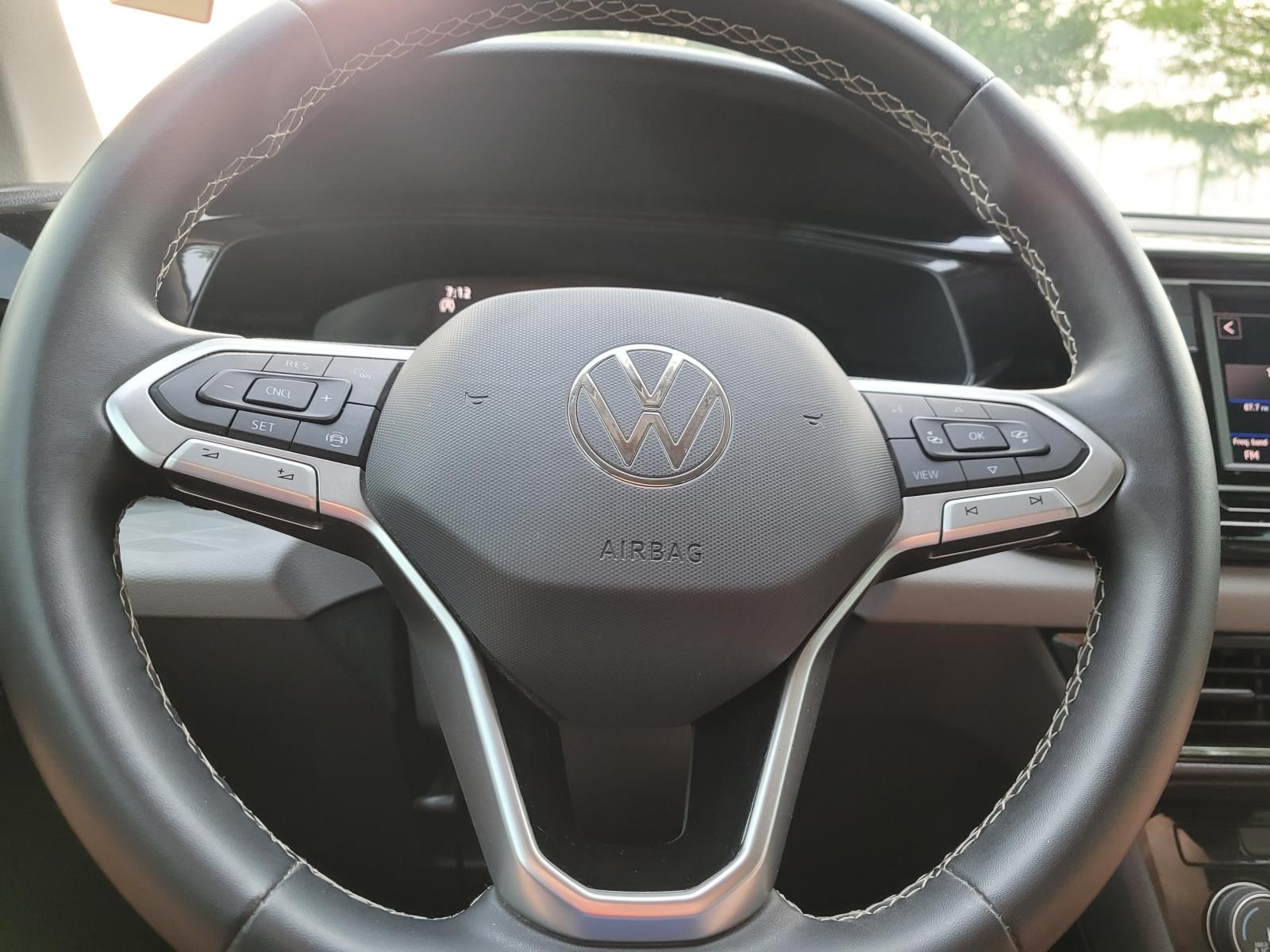 used 2023 Volkswagen Taos car, priced at $18,500