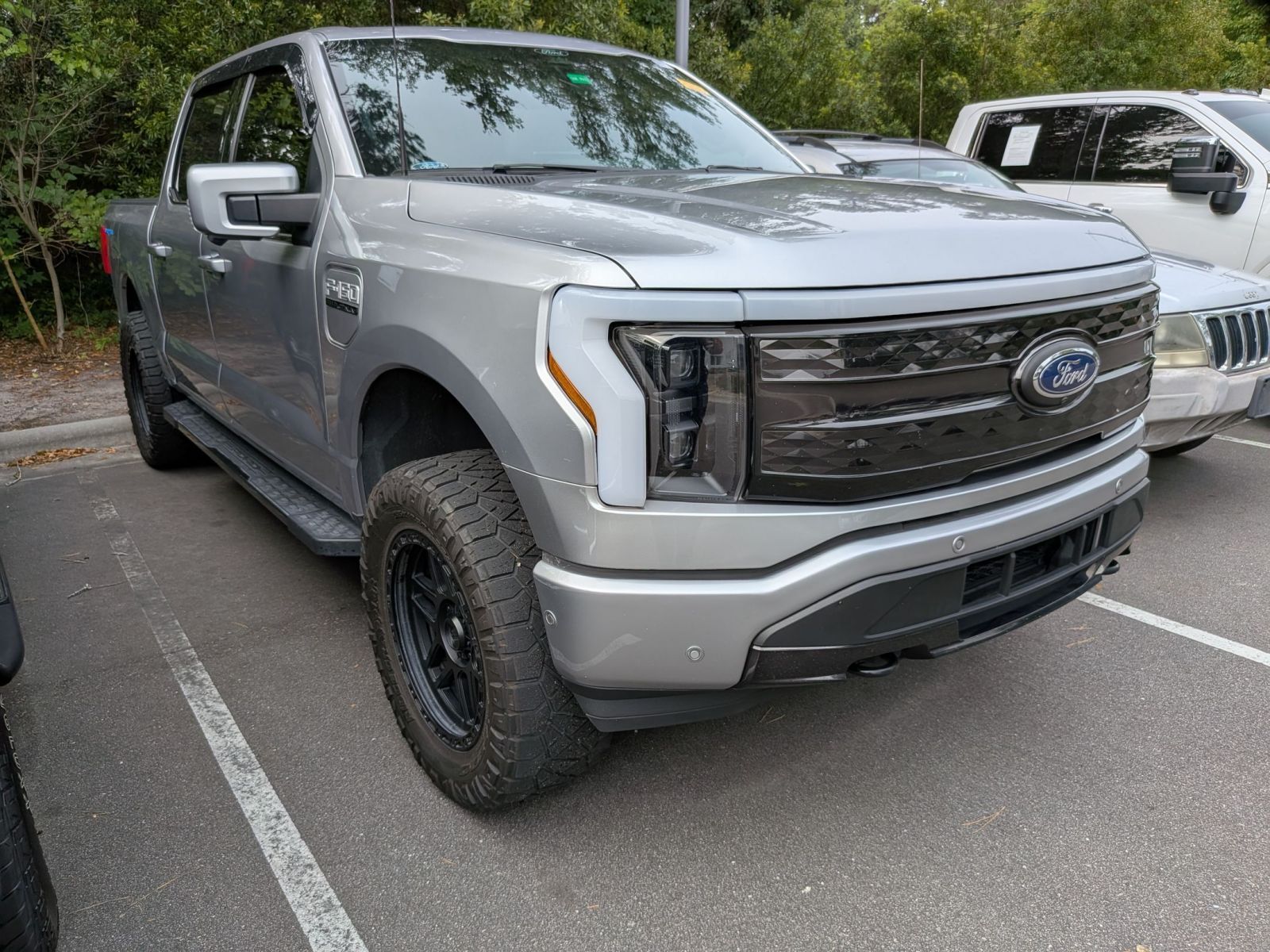 Iconic Silver Metallic 2022 Ford F-150 Lightning Platinum SuperCrew AWD Pickup Truck All-Wheel Drive Automatic