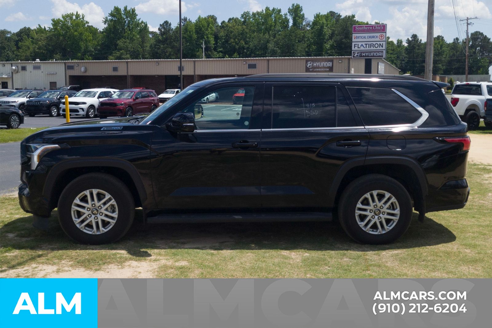 Used 2025 Midnight Black Metallic Toyota SR5 image 10